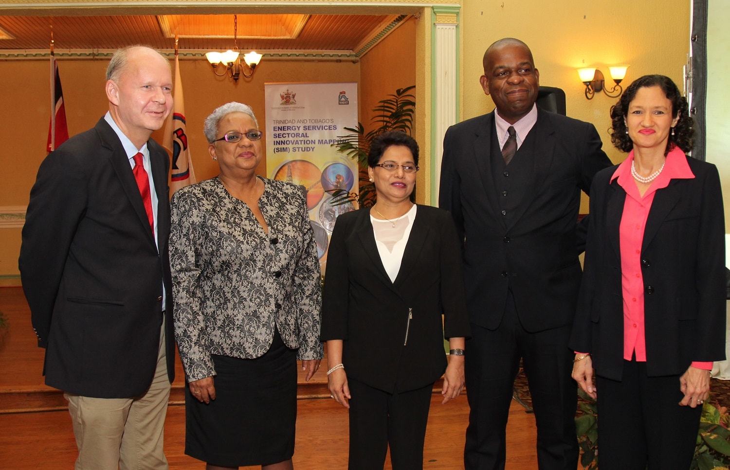 Minister in the Ministry of Education, Hon. Lovell Francis (second from right), Permanent Secretary in the Ministry of Education Ms. Angela Sinaswee-Gervais (second from left), Programme Manager of the EU Delegation Dr. Ulrich Thiessen (left), NIHERST President (Ag.) Ms. Sylvia Lalla (centre) and NIHERST Senior HR Officer Mrs. Giselle Dinzey (right), share a light moment as they welcome this type of research.